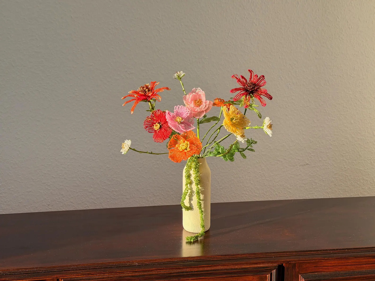 Hand-beaded bouquet on a wooden table